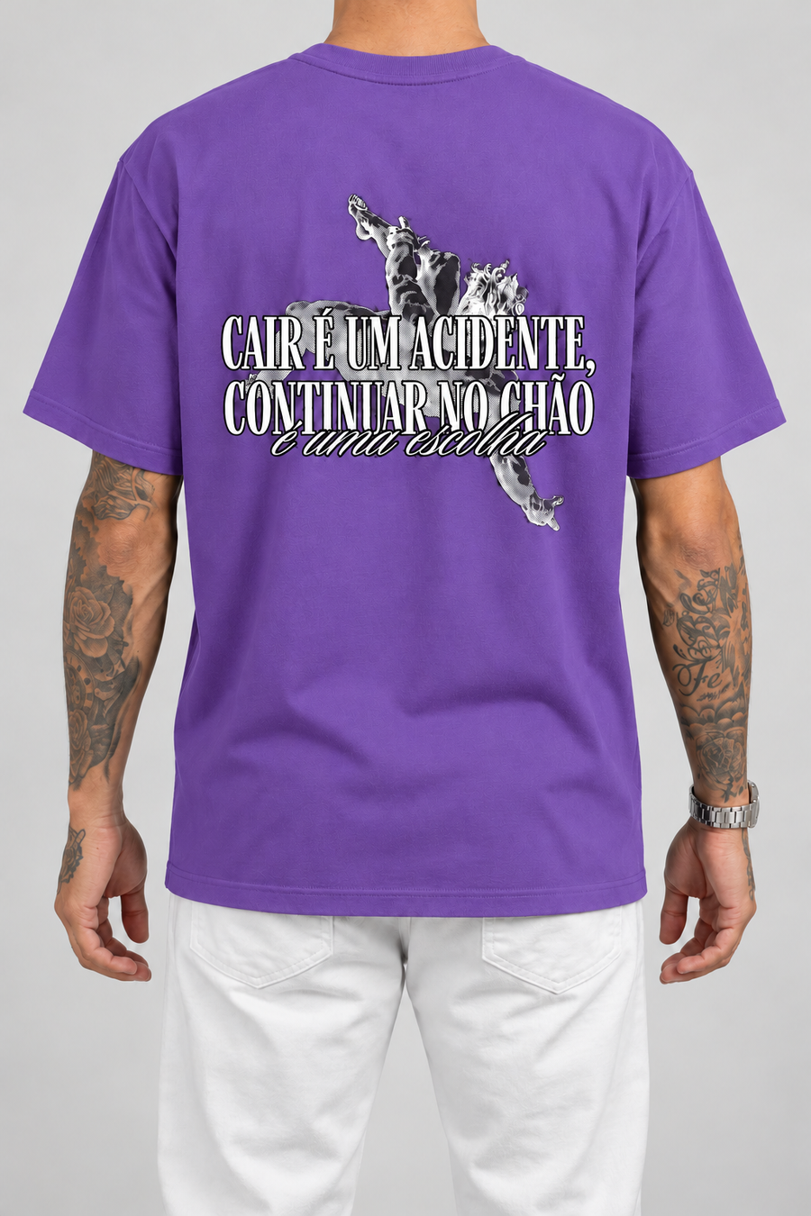 Cor: Roxo | Costas | Camiseta Cair é um Acidente, Continuar no Chão é uma Escolha (Verso)