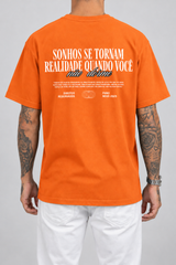 Cor: Laranja | Costas | Camiseta Sonhos se Tornam Realidade, Quando Você não Dorme (Verso)