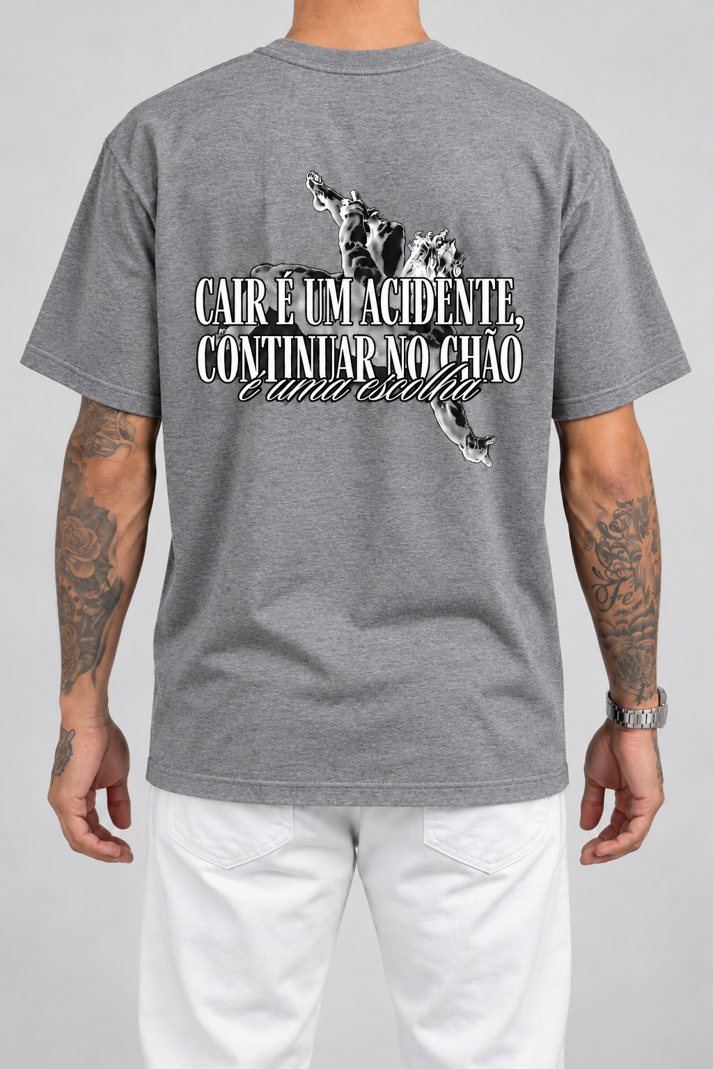 Cor: Cinza | Costas | Camiseta Cair é um Acidente, Continuar no Chão é uma Escolha (Verso)