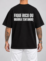 Cor: Preto | Costas | Oversized — Camiseta Fique Rico ou Morra Tentando (Verso)